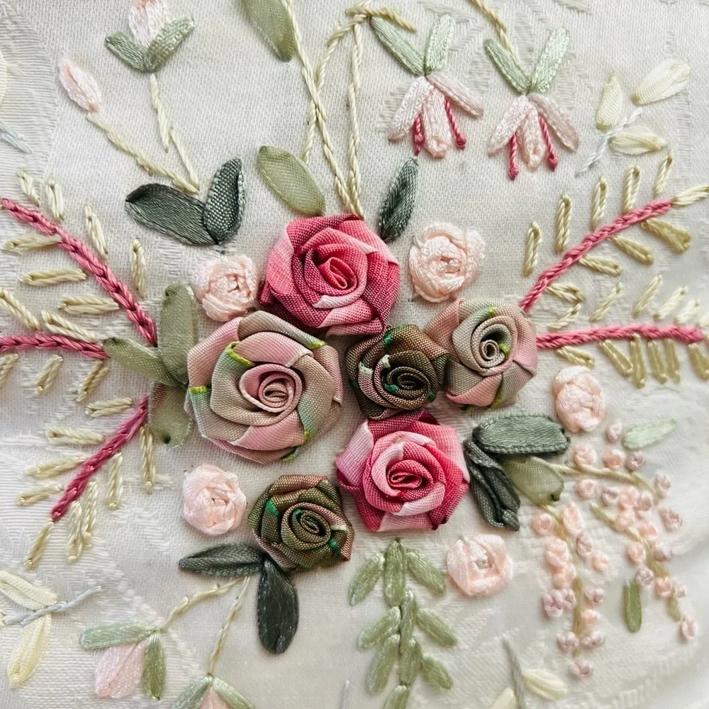 13”x13” decorative pillow hand-stitched ribbon.
